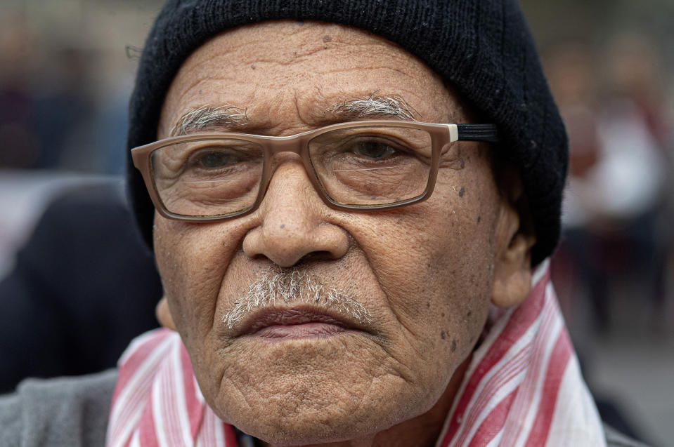 In this Monday, Dec. 23, 2019, photo, Bipin Phukan, 82, participates in a protest against the Citizenship Amendment Act (CAA) in Gauhati, India. Tens of thousands of protesters have taken to India’s streets to call for the revocation of the law, which critics say is the latest effort by Narendra Modi’s government to marginalize the country’s 200 million Muslims. Phukan said he was angry on the Bill being passed and made law and said he cannot accept the CAA. (AP Photo/Anupam Nath)