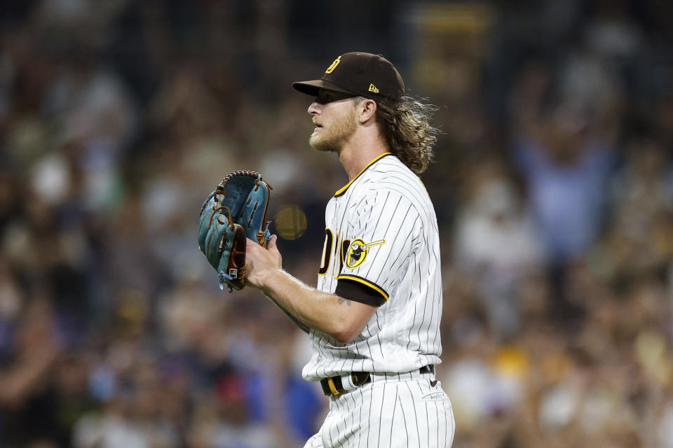 San Diego Padres' Josh Hader claps after the Padres defeated the Pittsburgh Pirates in a baseball game Tuesday, July 25, 2023, in San Diego. (AP Photo/Derrick Tuskan)