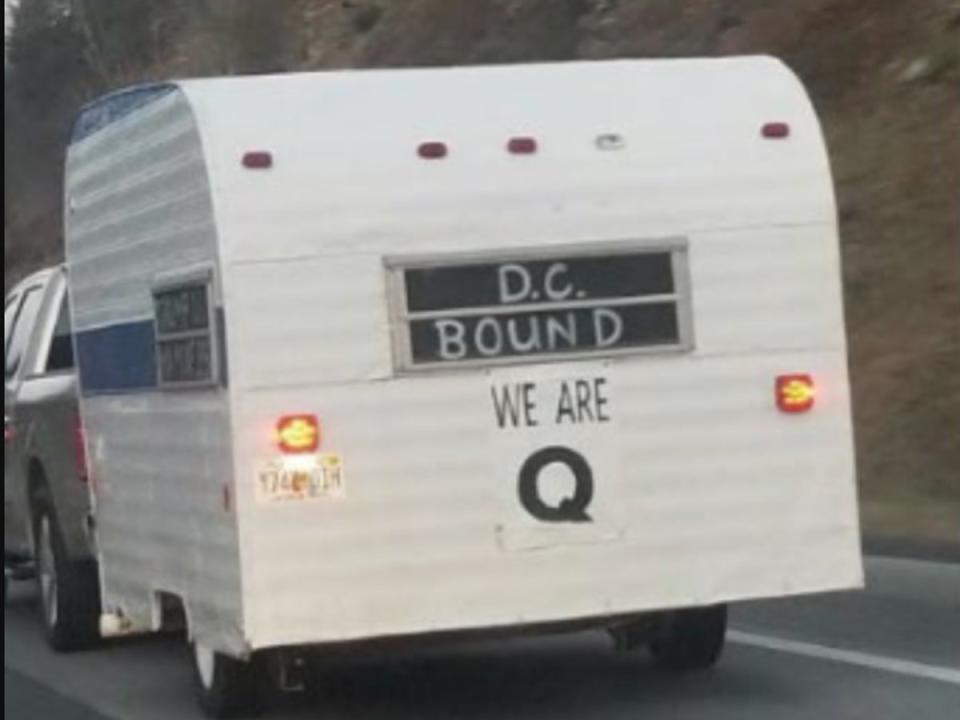 The Munn family camper adorned with the proclamation ‘DC Bound We Are Q' (Justice Department)