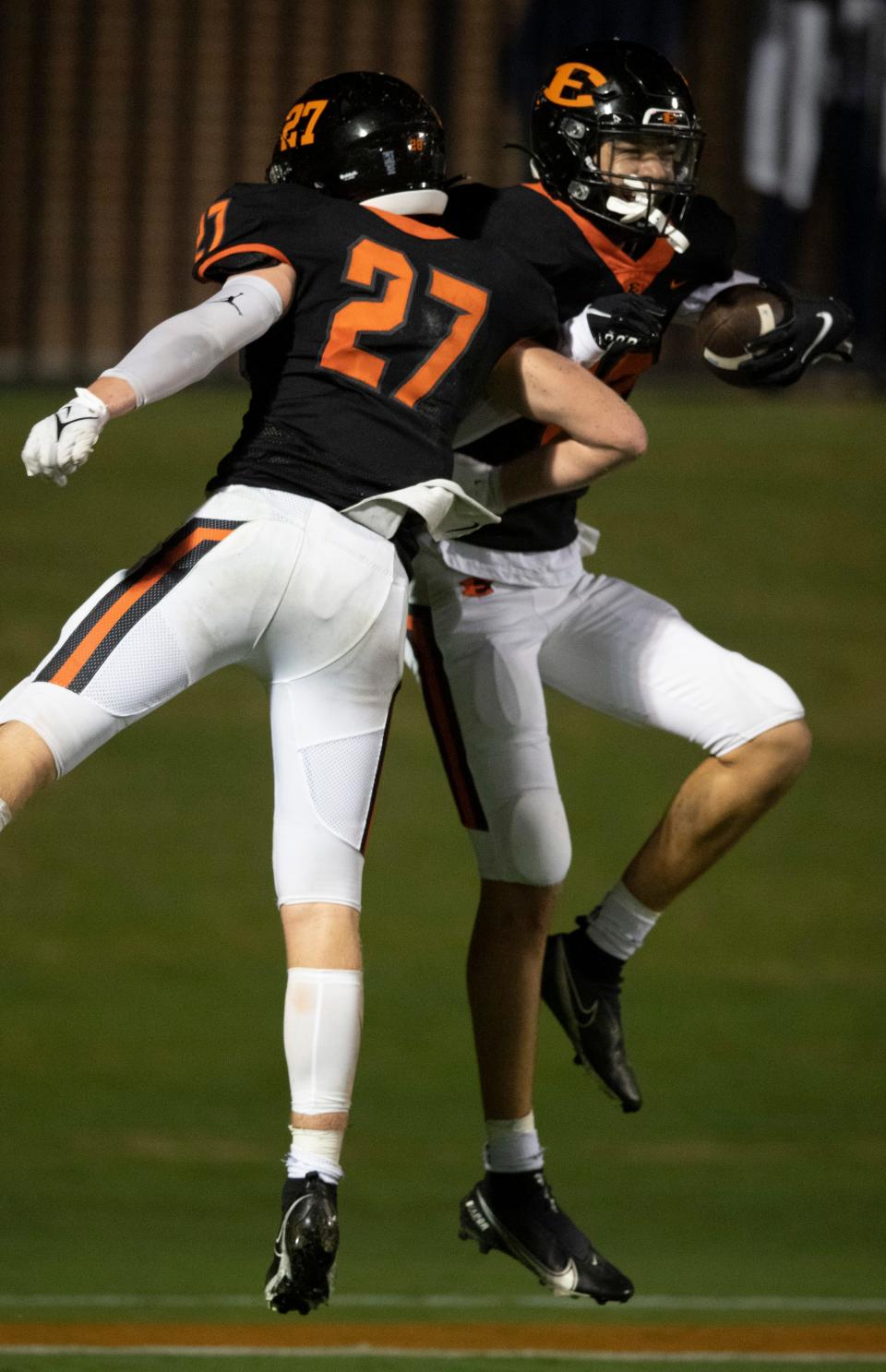 Ensworth's Sam Haley (27) and Mason Curtis (18) celebrate Curtis' interception for a touchdown against MUS  during the game at Ensworth Friday, Sept. 17, 2021 in Nashville, Tenn. 