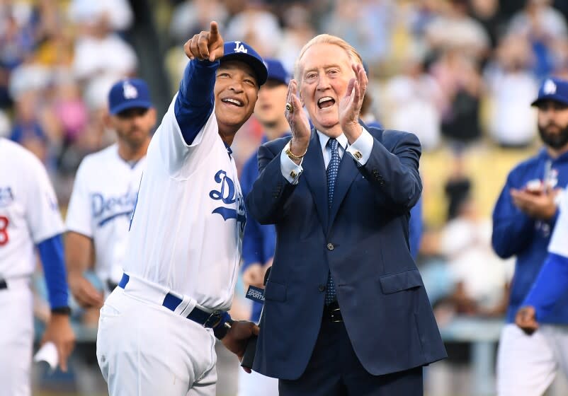 Dodgers manager Dave Roberts and Vin Scully