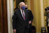 Sen. Patrick Leahy, D-Vt., the president pro tempore of the Senate, walks off the Senate floor on Capitol Hill in Washington, Monday, Jan. 25, 2021. Leahy will preside over former President Donald Trump's second impeachment trial. (AP Photo/Susan Walsh)