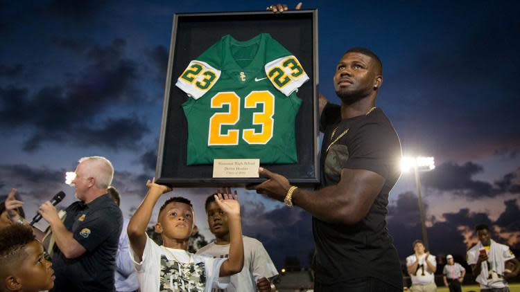 Devin Hester is honored during a ceremony in which Suncoast High retired his jersey in 2017.