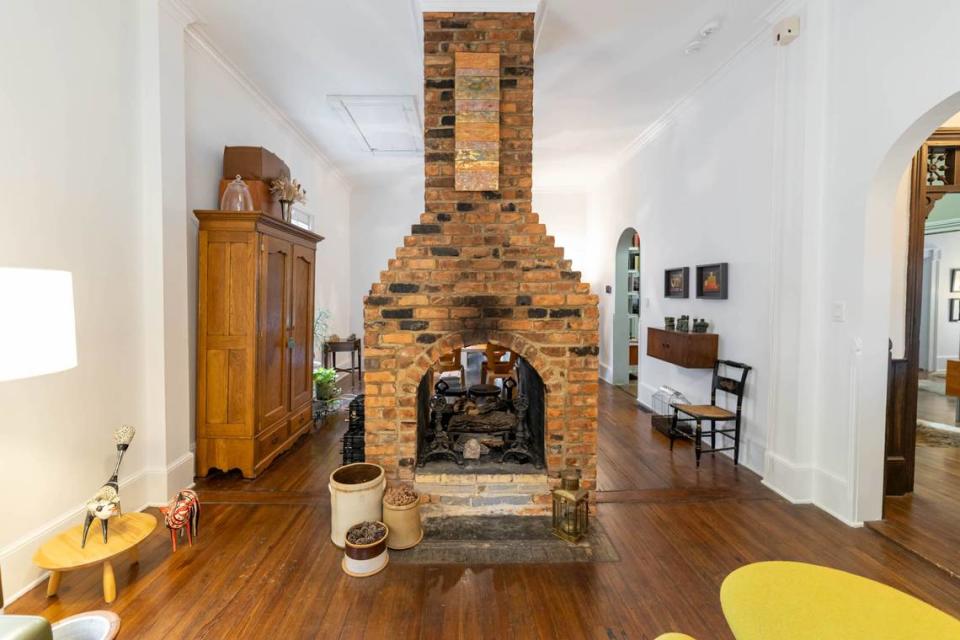 The living room of this Fourth Ward home, with its double fireplace, was built in 1820 and is the original portion of the house.