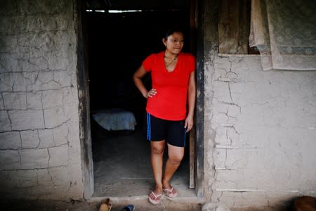 Norma Mendez, wife of Salvadoran migrant Marvin Antonio Gonzalez, who recently died in a border detention center in New Mexico, is pictured at her home in Verapaz