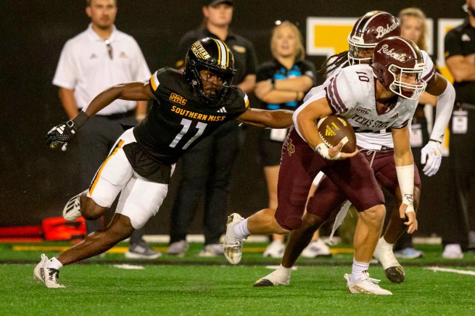 Southern Miss Golden Eagles cornerback MJ Daniels (11) chases after Texas State Bobcats wide receiver Joey Hobert (10) during a game against Texas State at M.M. Roberts Stadium in Hattiesburg on Saturday, Sept. 30, 2023.