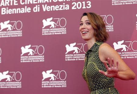 Actress Rebecca Hall poses during a photocall for the movie "Une Promesse", directed by Patrice Leconte, during the 70th Venice Film Festival in Venice September 4, 2013. REUTERS/Alessandro Bianchi