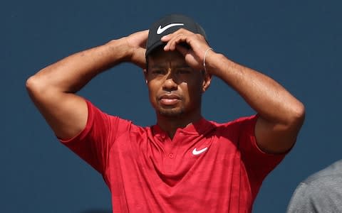 Woods starts with a par on the first - Credit: Jane Barlow/PA