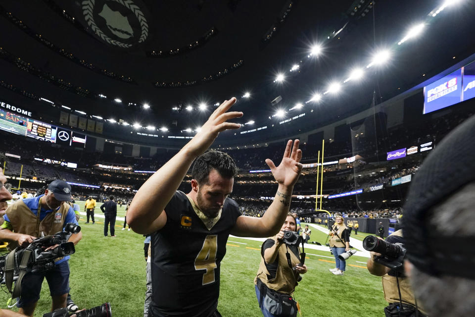 New Orleans Saints quarterback Derek Carr (4) celebrates the team's win against the Tennessee Titans after an NFL football game in New Orleans, Sunday, Sept. 10, 2023. (AP Photo/Gerald Herbert)