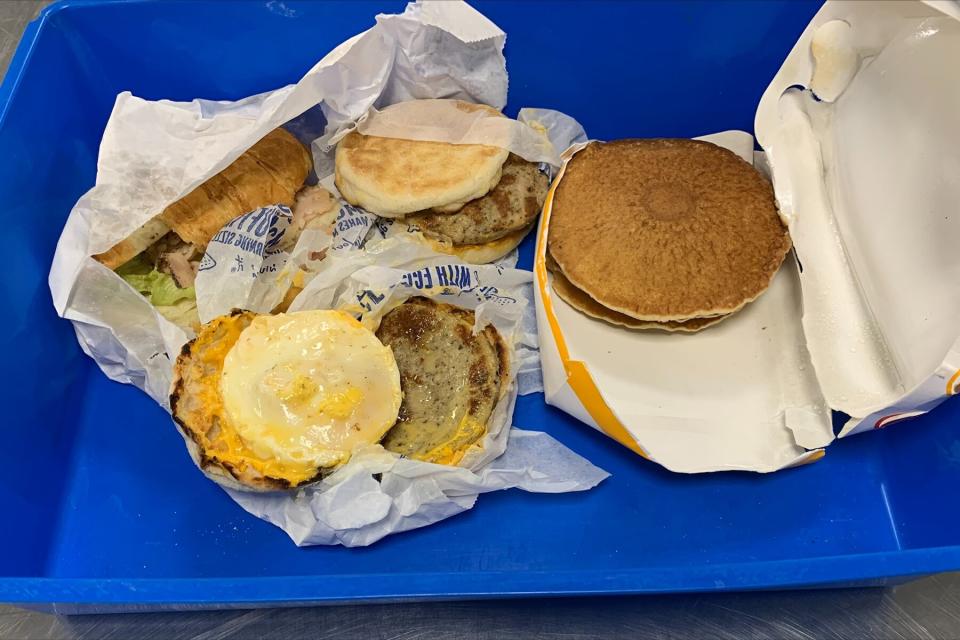 Undeclared FMD-risk products "McDonald's Egg McMuffin and pancakes," found by Zinta at Darwin airport