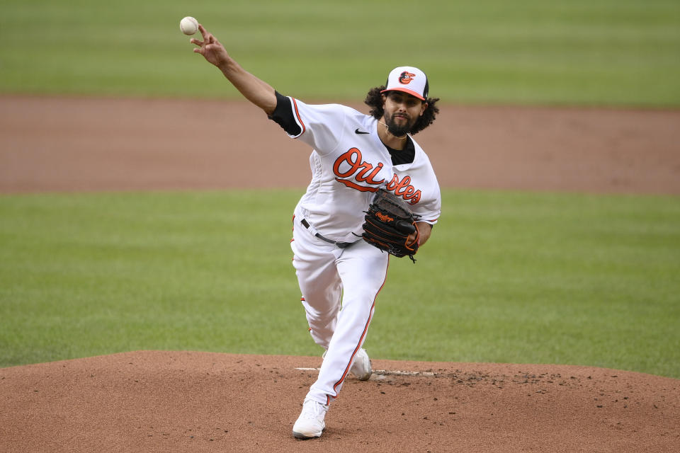 Baltimore Orioles starting pitcher Jorge Lopez delivers the first inning of a baseball game against the Houston Astros, Tuesday, June 22, 2021, in Baltimore. (AP Photo/Nick Wass)