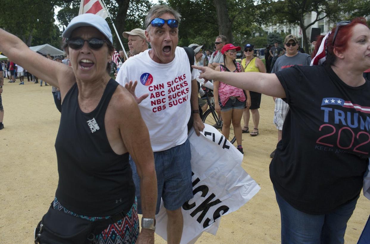 People see bias in the stories that favor the other party, but they tend not to see bias in stories favoring their own party. <a href="https://www.gettyimages.com/detail/news-photo/supporters-of-u-s-president-donald-trump-scream-at-the-news-photo/849970634?adppopup=true" rel="nofollow noopener" target="_blank" data-ylk="slk:Andrew Lichtenstein/Corbis via Getty Images;elm:context_link;itc:0;sec:content-canvas" class="link ">Andrew Lichtenstein/Corbis via Getty Images</a>