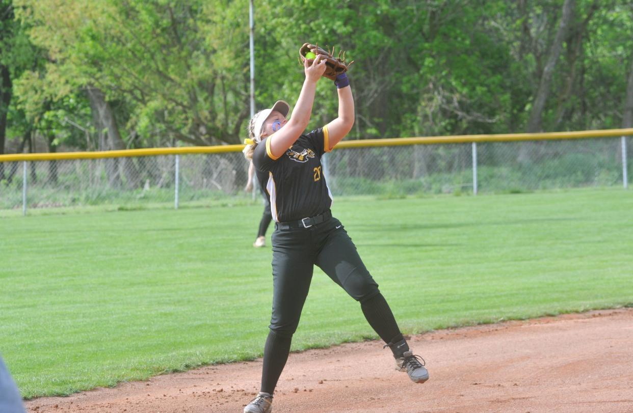 Colonel Crawford's Hannah Allen catches a pop-up.