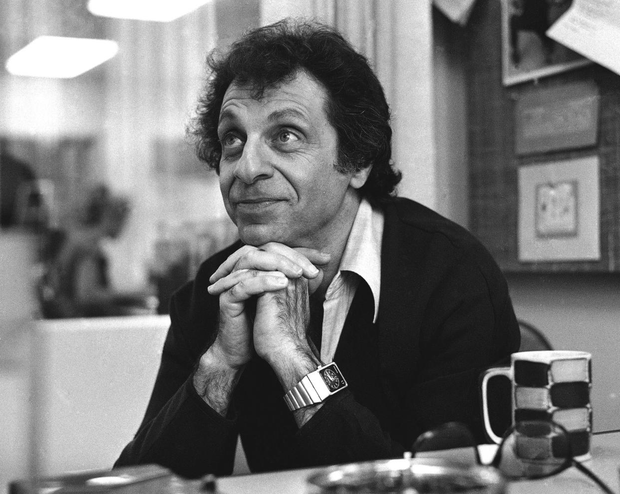 In this Jan. 3, 1977, photo, Comedian Mort Sahl sits for an interview in San Francisco. Sahl, who helped revolutionize stand-up comedy during the Cold War with his running commentary on politicians and current events, died Tuesday, Oct. 26. 2021. He was 94. His friend Lucy Mercer said that he died "peacefully" at his home in Mill Valley, Calif.