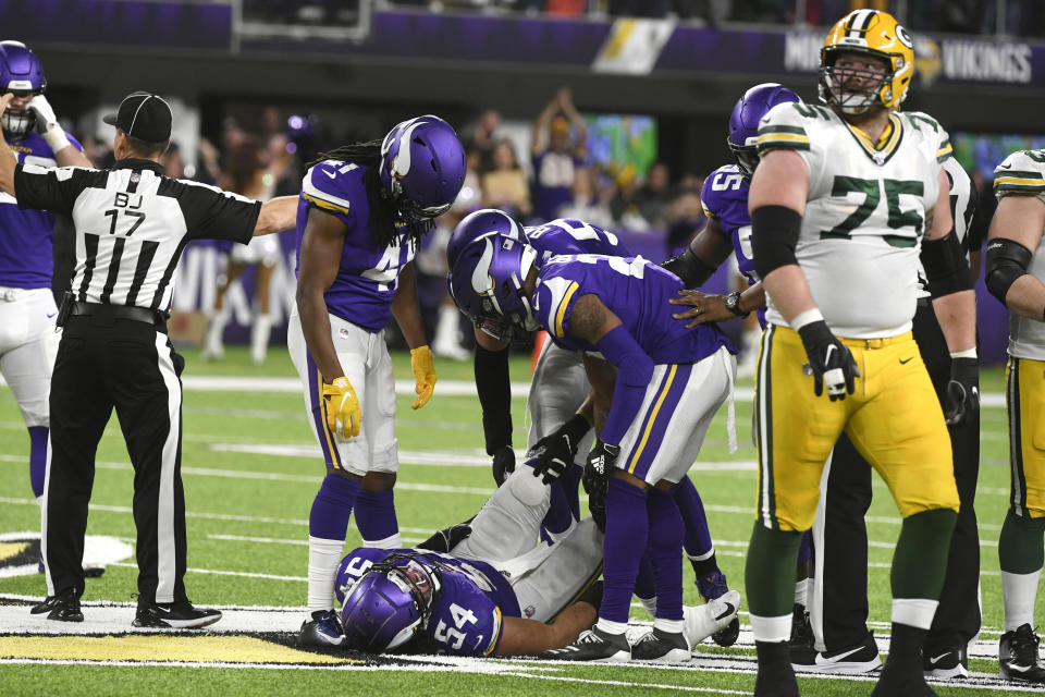 Minnesota Vikings middle linebacker Eric Kendricks (54) lies on the field after recovering a fumble during the first half of the team's NFL football game against the Green Bay Packers, Monday, Dec. 23, 2019, in Minneapolis. (AP Photo/Craig Lassig)