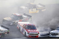 Brennan Poole (30) spins out during a NASCAR Truck Series auto race Saturday, June 13, 2020, in Homestead, Fla. (AP Photo/Wilfredo Lee)