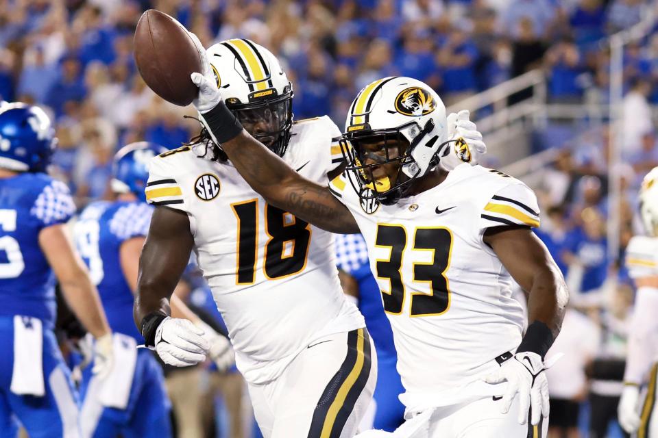 Missouri linebacker Chad Bailey (33) picks up a Kentucky fumble near the end zone during a game last season.