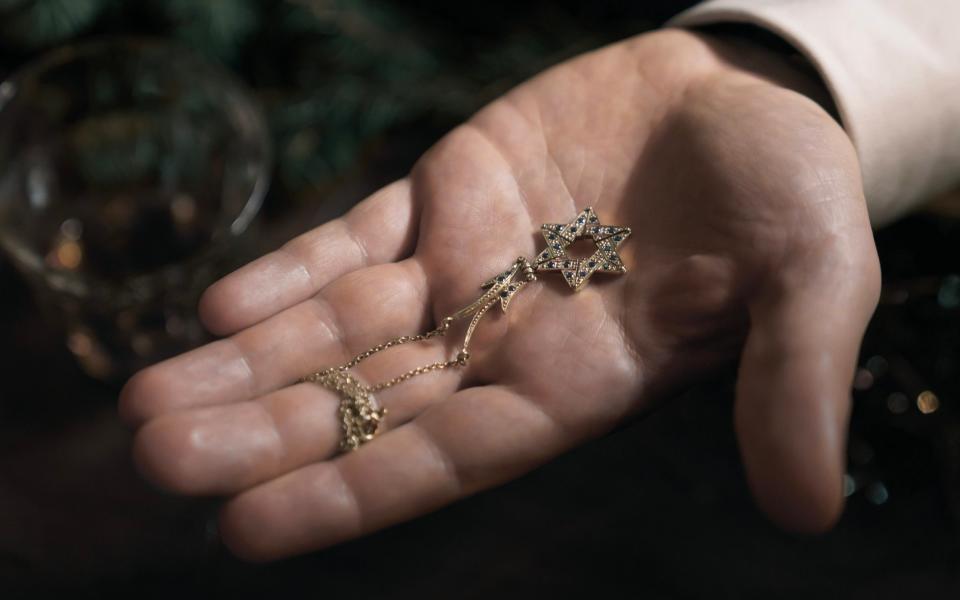 Martin's daughters have stopped wearing the Star of David necklace