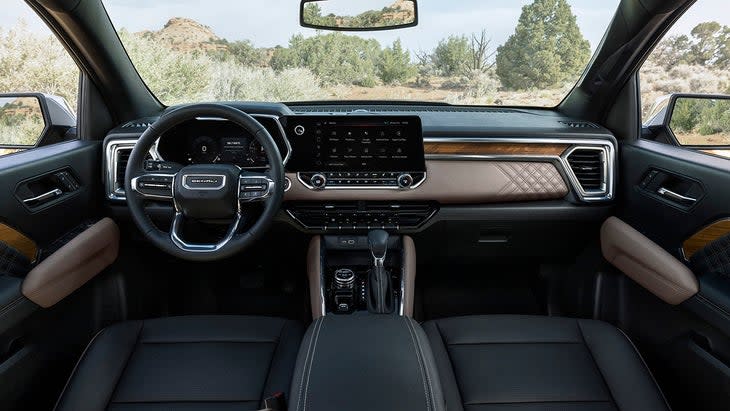 <span class="article__caption">Denali-trim levels bring classy, high-end materials to the interior. (Photo: GMC)</span>