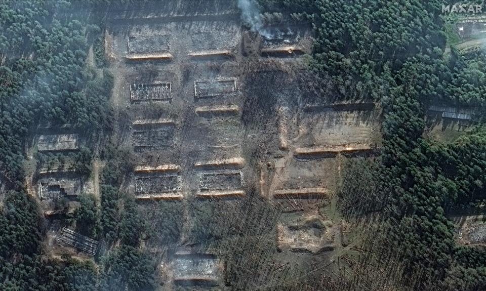 An aerial view of destroyed ammunition storage buildings.