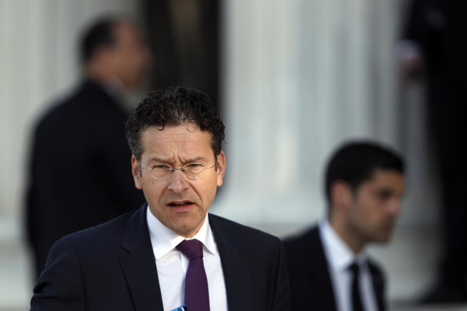 Eurogroup President Jeroen Dijsselbloem arrives at Zappeion hall to attend a Eurogroup meeting, in Athens on Tuesday, April 1, 2014. Finance ministers from the eurozone and the wider European Union are gathering in Athens amid tight security, with Greece hoping for a gesture of support for the release of long-delayed funds from the country's multi-billion-euro bailout. (AP Photo/Kostas Tsironis)