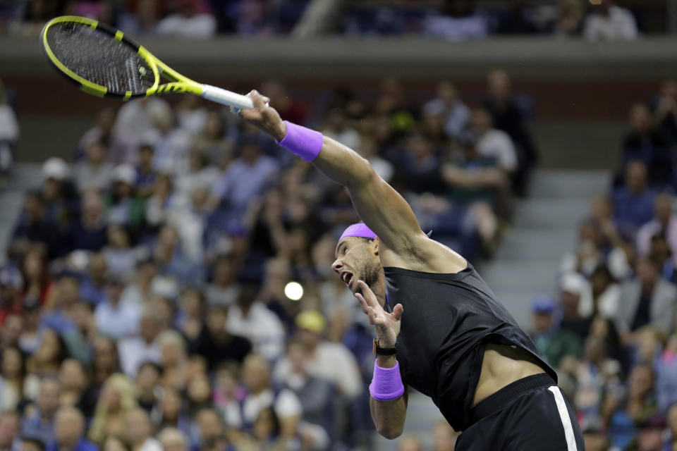 Rafael Nadal, of Spain, serves to Marin Cilic, of Croatia, during the fourth round of the U.S. Open tennis tournament Monday, Sept. 2, 2019, in New York. (AP Photo/Seth Wenig)