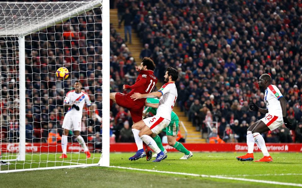 Mohamed Salah prods home Liverpool's third from close range - PA