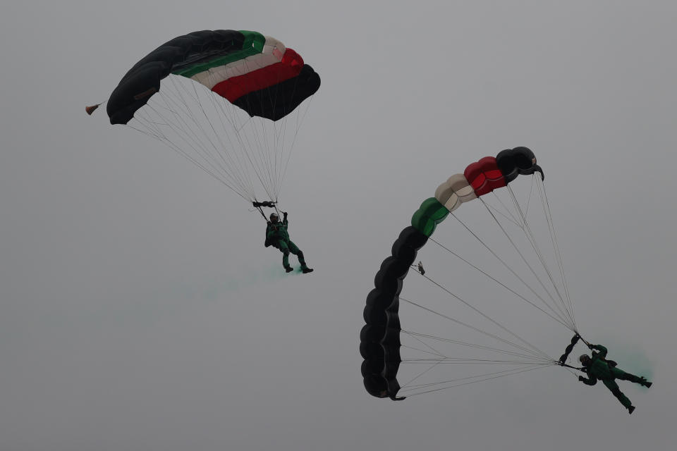 VARIOUS CITIES, MEXICO - SEPTEMBER 16: Parachuters of the Mexican army take part in the Independence Day military parade at Zocalo Square on September 16, 2020 in Various Cities, Mexico. This year El Zocalo remains closed for general public due to coronavirus restrictions. Every September 16 Mexico celebrates the beginning of the revolution uprising of 1810. (Photo by Hector Vivas/Getty Images)