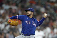 Texas Rangers starting pitcher Martin Perez throws against the Texas Rangers during the first inning of a baseball game Tuesday, Aug. 9, 2022, in Houston. (AP Photo/David J. Phillip)