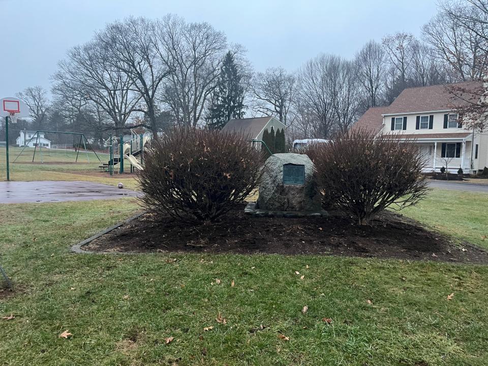 The sign at Mount Wayte that partially describes the "Eames Massacre" incident is on a rock in a neighborhood park.