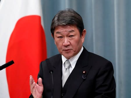 Japan's new Foreign Minister Motegi attends a news conference at PM Abe's official residence in Tokyo