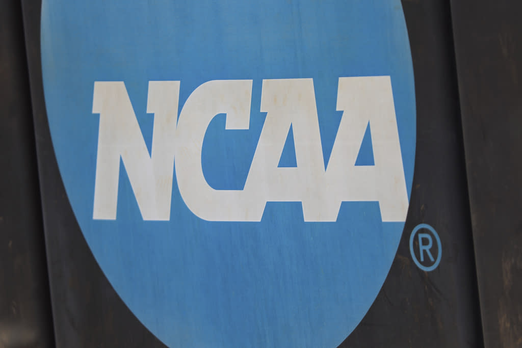 NCAA logo displayed on a fence 