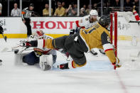 Vegas Golden Knights center Brett Howden (21) scores on Florida Panthers goaltender Sergei Bobrovsky during the second period of Game 2 of the NHL hockey Stanley Cup Finals, Monday, June 5, 2023, in Las Vegas. (AP Photo/John Locher)