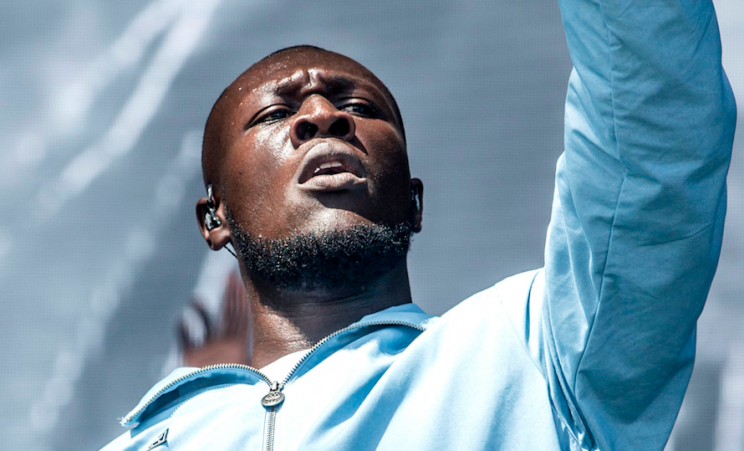 Stormzy raps on the track (PA)