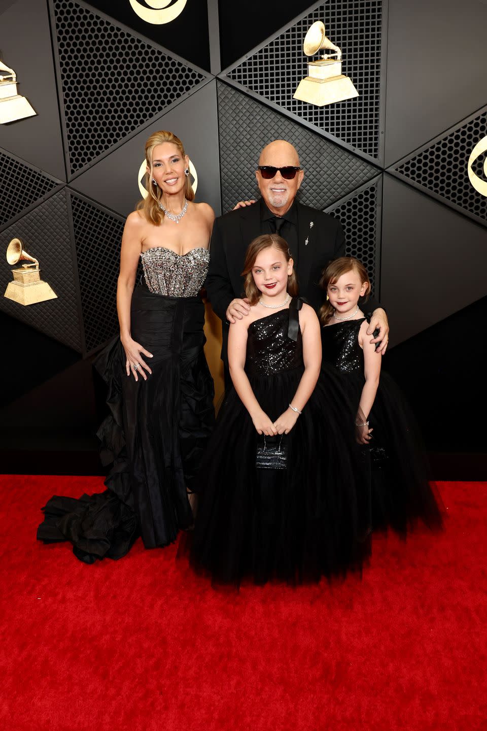 billy joel and family at 66th grammy awards