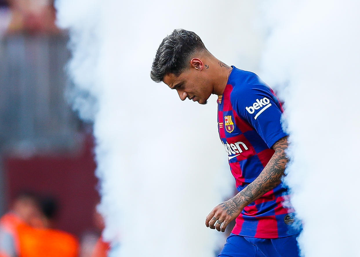 BARCELONA, SPAIN - AUGUST 04: Philippe Coutinho of FC Barcelona waves to supporters ahead of the match between FC Barcelona and Arsenal at Nou Camp on August 04, 2019 in Barcelona, Spain. (Photo by Eric Alonso/MB Media/Getty Images)