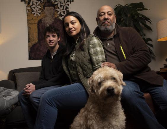 Perry Muth with Marisa’s parents, Leigh Miller and Patrick Harris, and their dog, Max (The Washington Post/Marvin Joseph)
