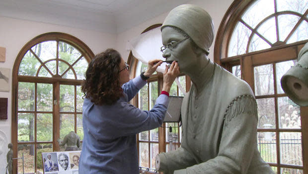 Artist Meredith Bergmann works on her statue of suffragist Sojourner Truth, part of the Women's Rights Pioneers Monument. / Credit: CBS News