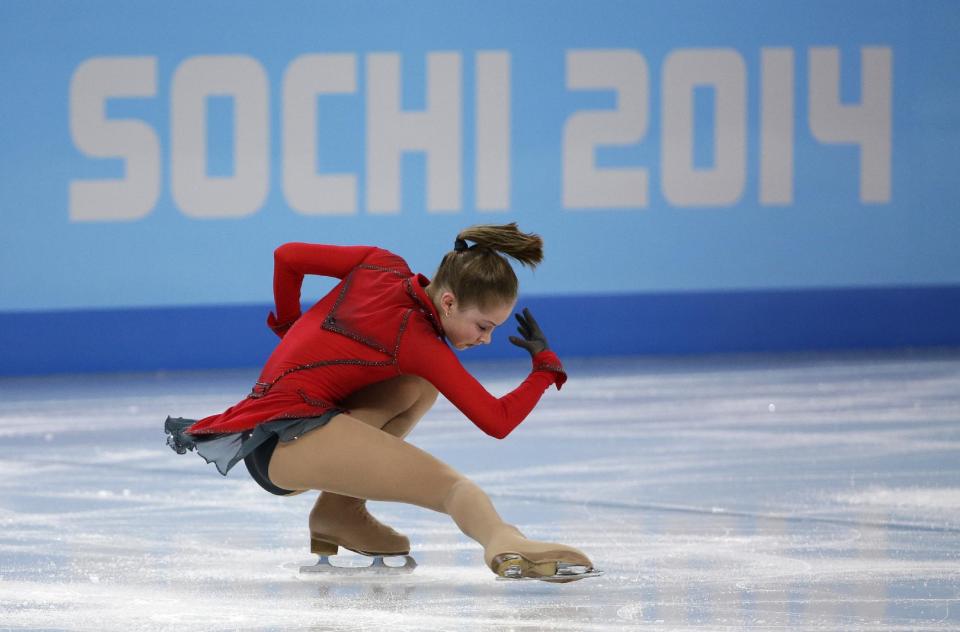 Julia Lipnitskaia of Russia competes in the women's team free skate figure skating competition at the Iceberg Skating Palace during the 2014 Winter Olympics, Sunday, Feb. 9, 2014, in Sochi, Russia. (AP Photo/David J. Phillip )