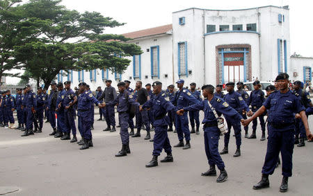 Riot policemen parade before blocking demonstrators during a protest against President Joseph Kabila organized, by the Catholic church in Kinshasa, Democratic Republic of Congo January 21, 2018. REUTERS/Kenny Katombe