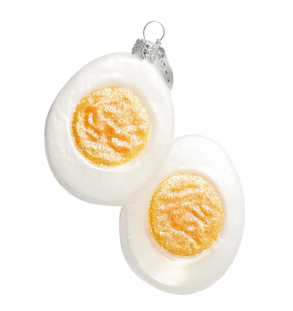 No yolk: This glitter-dusted ornament is the perfect stocking stuffer to send an egg lover. <a href="https://fave.co/3mXWO7w" target="_blank" rel="noopener noreferrer">﻿Find it for $14 at Nordstrom</a>.