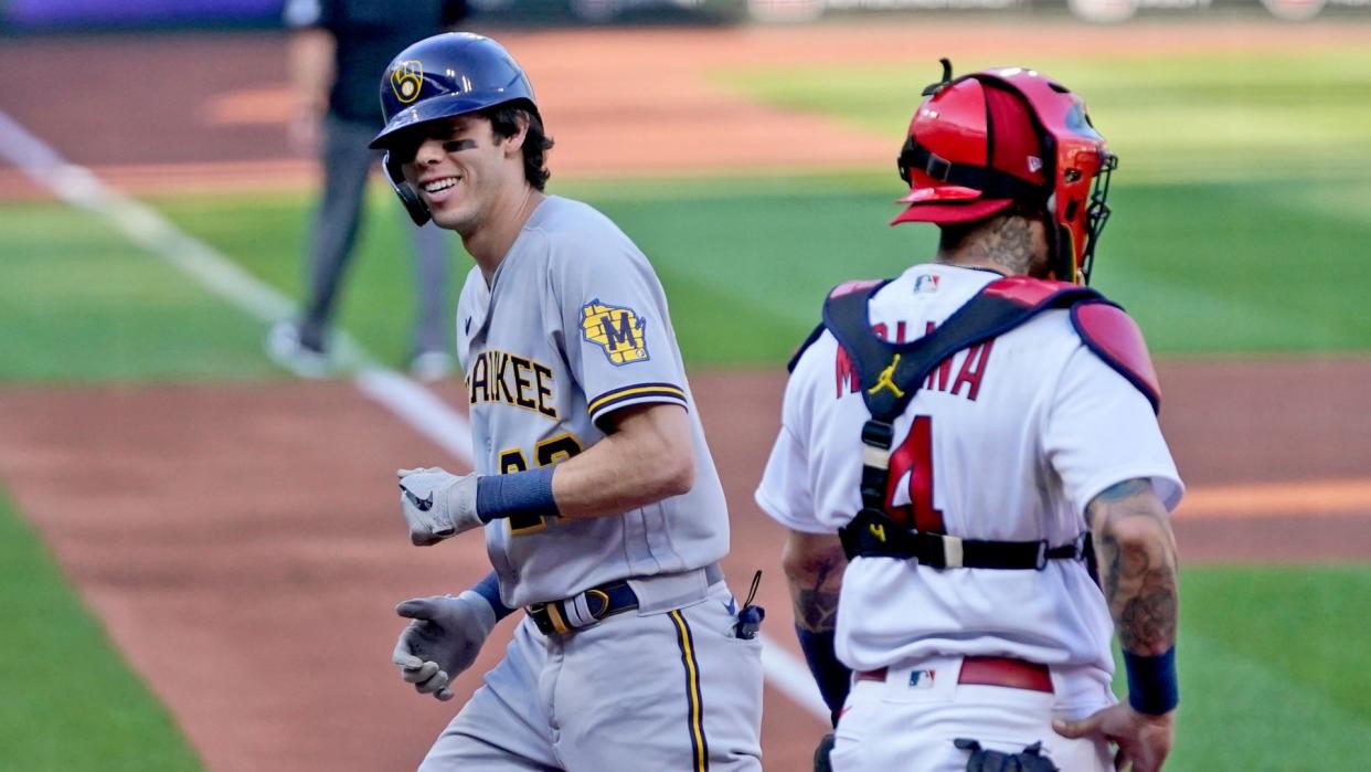 Mandatory Credit: Photo by Jeff Roberson/AP/Shutterstock (10790683j)Milwaukee Brewers' Christian Yelich, right, smiles as he looks back at St.