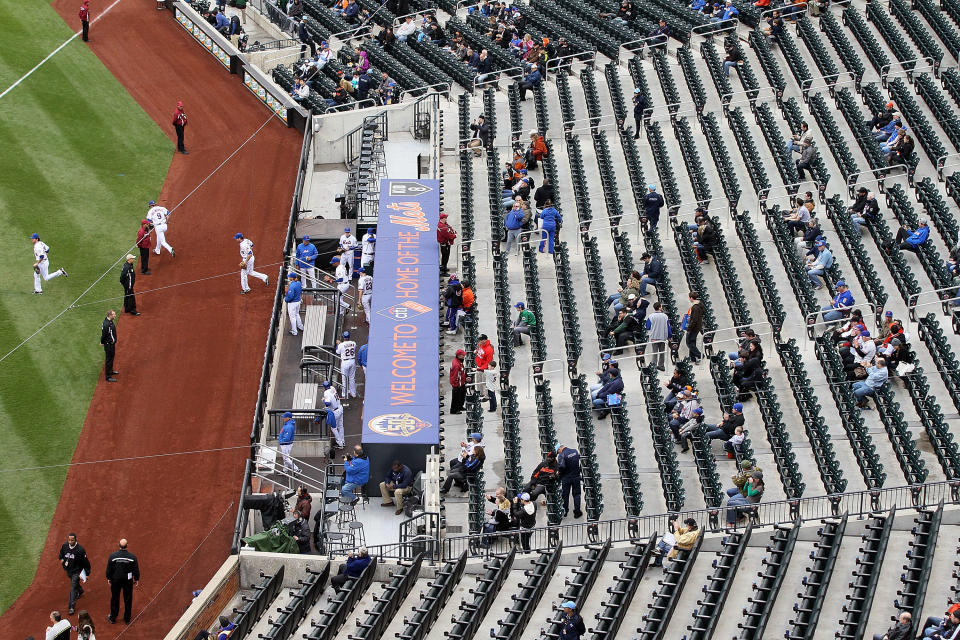 Empty seats are seen as the New York Mets take the field to play against the San Francisco Giants at Citi Field on April 23, 2012 in the Flushing neighborhood of the Queens borough of New York City. (Photo by Jim McIsaac/Getty Images)
