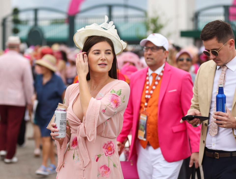 Colorful hats were part of the fashion scene at Oaks Day on Friday at Churchill Downs.  May 6, 2022