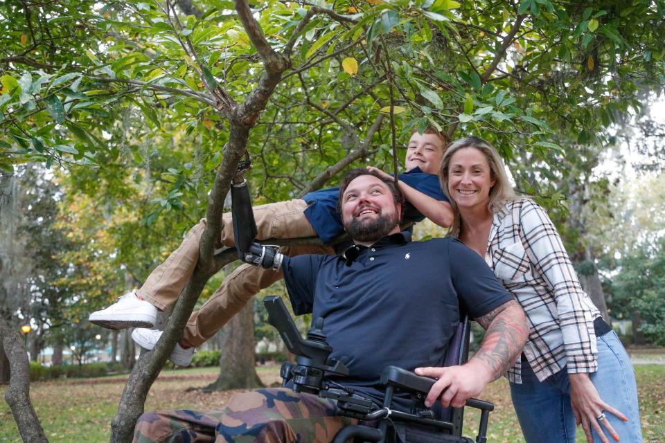 Ryan Davis with his wife Asia and son Knox at Forsyth Park in Savannah Georgia. Ryan, an Army Ranger, was severely injured from a blast in August of 2019 during an operation in Afghanistan.