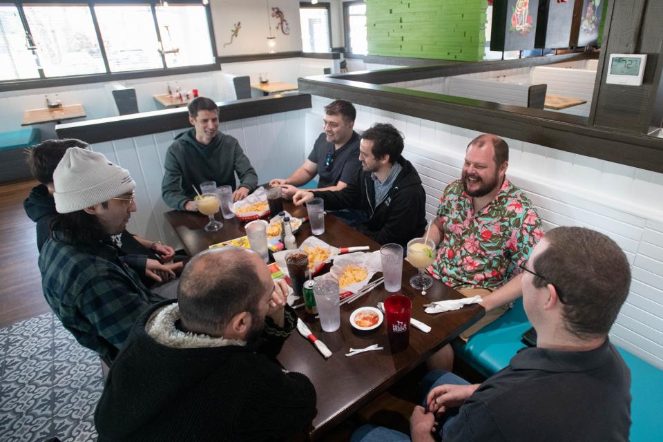 IHMC and Boardwalk Robotics employees have lunch at Cactus Cantina Mexican Grill's newest location at 601 East Gregory Street in Pensacola on Monday, Feb. 26, 2024.