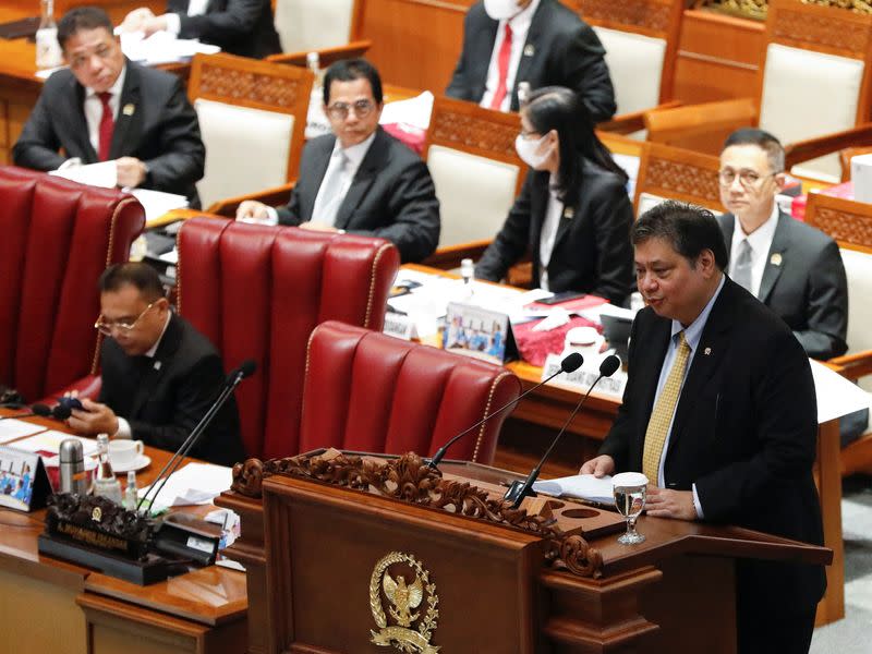 Indonesian Coordinating Minister for Economic Affairs, Airlangga Hartarto delivers his remarks on the new job and investment law during the parliamentary plenary meeting in Jakarta