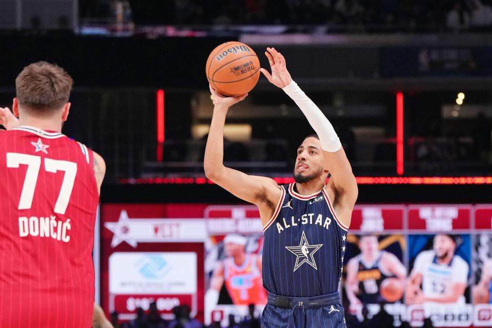 Eastern Conference guard Tyrese Haliburton of the Indiana Pacers shoots a 3-point shot to become the first team in NBA All Star history to reach 200 points during the All Star game at Gainbridge Fieldhouse in Indianapolis, Feb. 18, 2024.