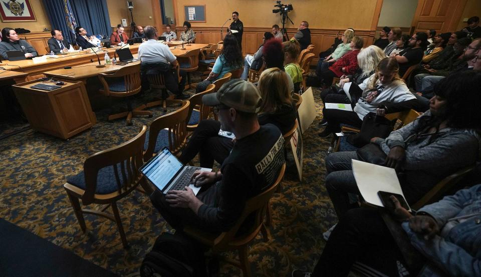 The public shares their comments about the video release policy with the Fire and Police Commission on Thursday at City Hall in Milwaukee.