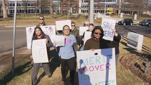 PHOTO: Parents picket about the merit controversy in Fairfax County, Virginia, on Jan. 14, 2023. (WJLA)